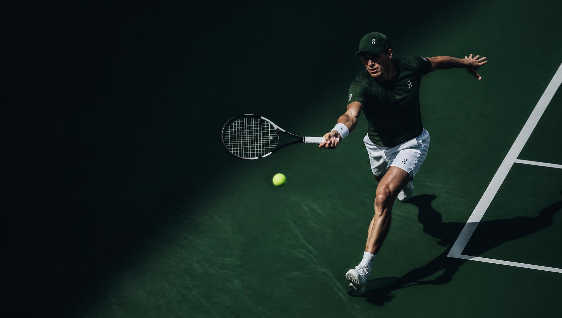 Neon Night glow-in-the-dark dempers op een tennisracket